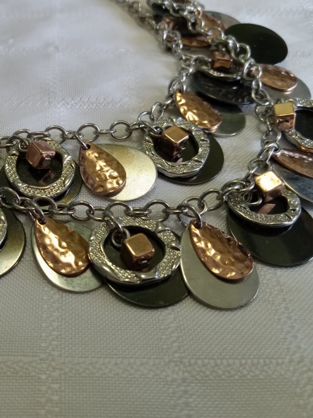 Vintage Kinetic statement necklace by Nygard, featuring layered medallions